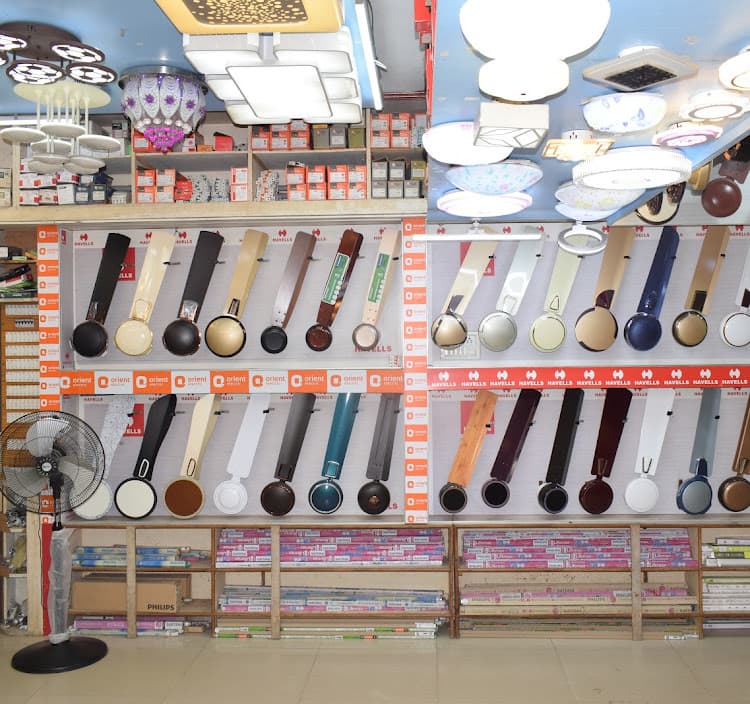 Ceiling fans and water heaters displayed in rows